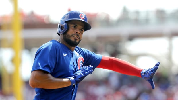 Sep 3, 2023; Cincinnati, Ohio, USA; Chicago Cubs third baseman Jeimer Candelario (9) reacts as he runs the bases after hitting a solo home run against the Cincinnati Reds during the ninth inning at Great American Ball Park. Mandatory Credit: David Kohl-USA TODAY Sports  